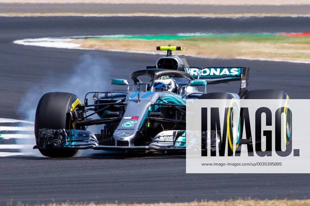 6th July 2018, Silverstone Circuit, Silverstone, England; British Formula One Grand Prix, Friday free practice; Valtteri Bottas locks a front wheel on his Mercedes AMG Petronas Motorsport Mercedes F1 W09 ActionPlus12044453 TimxWilliams