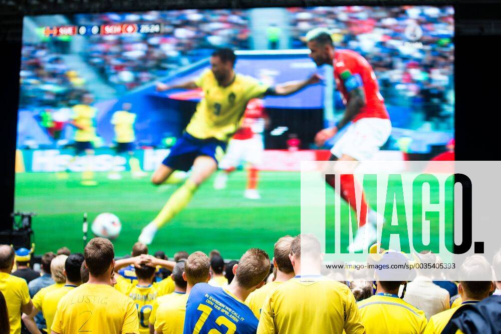Supporters at Tele2 Arena see a big screen screen during the final round of the World Cup between Sweden and Switzerland on July 3, 2018 in Stockholm