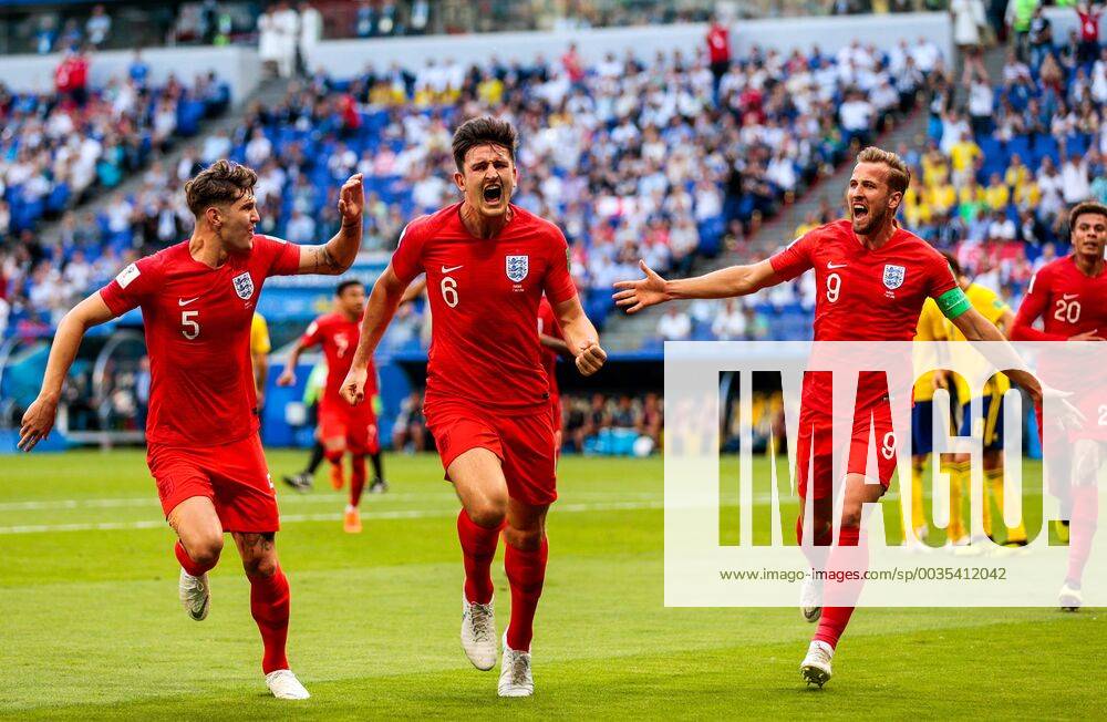 England s John Stones, Harry Maguire and Harry Kane (L-R) celebrate scoring in the 2018 FIFA World Cup WM Weltmeisterschaft Fussball Quarterfinal match against Sweden at Samara Arena Stadium. Denis Tyrin TASS TS088712