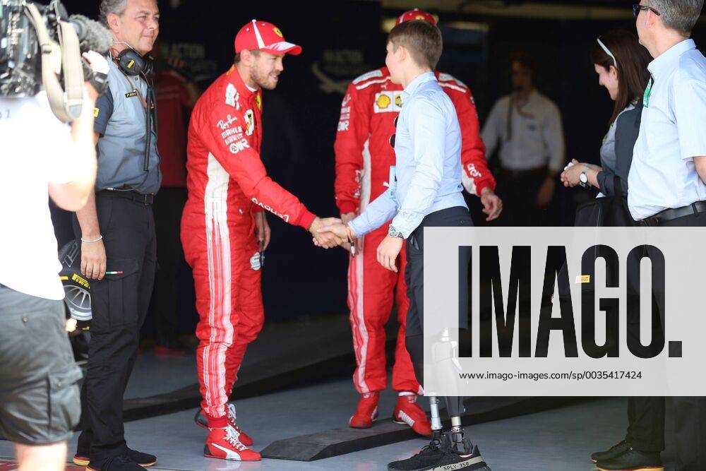 Photo4 LaPresse 07 07 2018 Silverstone, England Grand Prix Formula One England 2018 In the pic: Billy Monger (GBR) and Sebastian Vettel (GER) Scuderia Ferrari SF71H