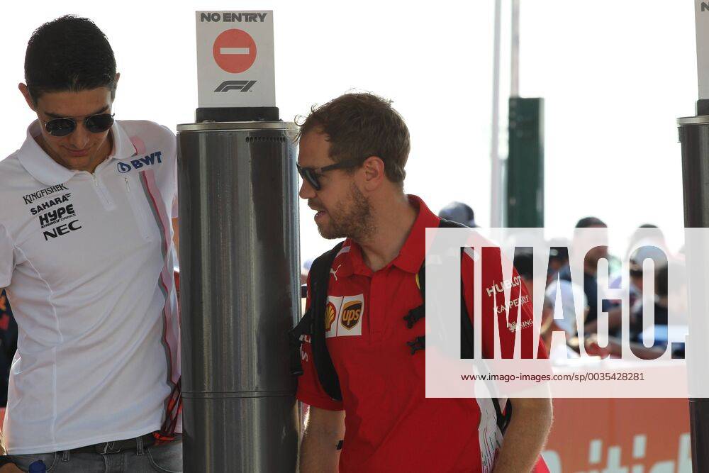 Photo4 LaPresse 08 07 2018 Silverstone, England Grand Prix Formula One England 2018 In the pic: Sebastian Vettel (GER) Scuderia Ferrari SF71H AND Esteban Ocon (FRA) Sahara Force India F1 VJM11