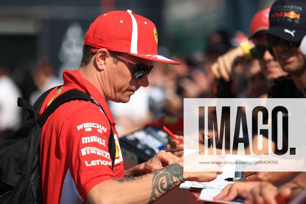 8th July 2018, Silverstone Circuit, Silverstone, England; British Formula One Grand Prix, Race Day; Scuderia Ferrari, Kimi Raikkonen signs autographs ActionPlus12045421 Octane