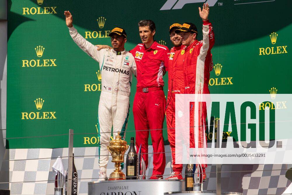 8th July 2018, Silverstone Circuit, Silverstone, England; British Formula One Grand Prix, Race Day; The podium. Scuderia Ferrari driver Sebastian Vettel, Mercedes AMG Petronas Motorsport driver Lewis Hamilton and Scuderia Ferrari driver Kimi Raikkonen ActionPlus12045550 TimxWilliams