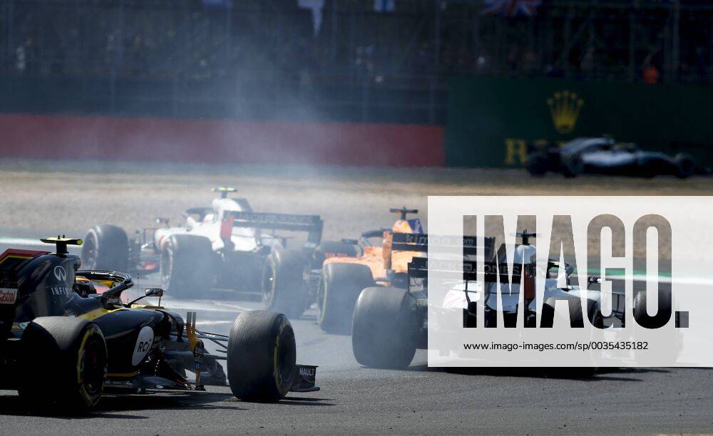 Motorsports: FIA Formula One World Championship WM Weltmeisterschaft 2018, Grand Prix of Great Britain, 55 Carlos Sainz jr. (ESP, Renault Formula One Team), 8 Romain Grosjean (FRA, Haas F1 Team), Silverstone Great Britain