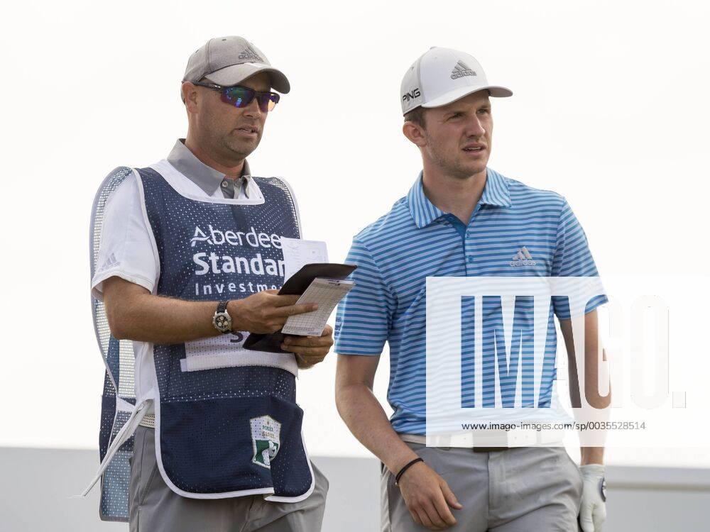 15th July 2018, Gullane Golf Club, Gullane, Scotland; Aberdeen Investments Scottish Open Golf, 4th round; Connor Syme discusses his set up with caddy on the second tee ActionPlus12047871 AlanxRennie