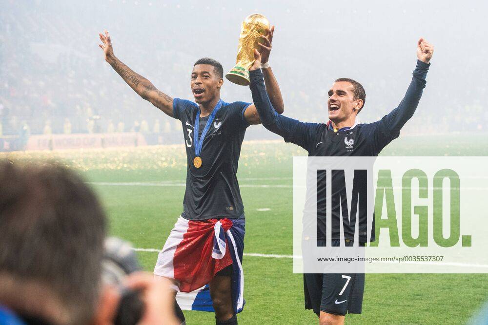 Presnel Kimpembe and Antoine Griezmann of France celebrate with the trophy after winning the FIFA World Cup final match between France and Croatia on July 15, 2018 in Moscow Photo Petter Arvidson BILDBYRAN Code PA 92087