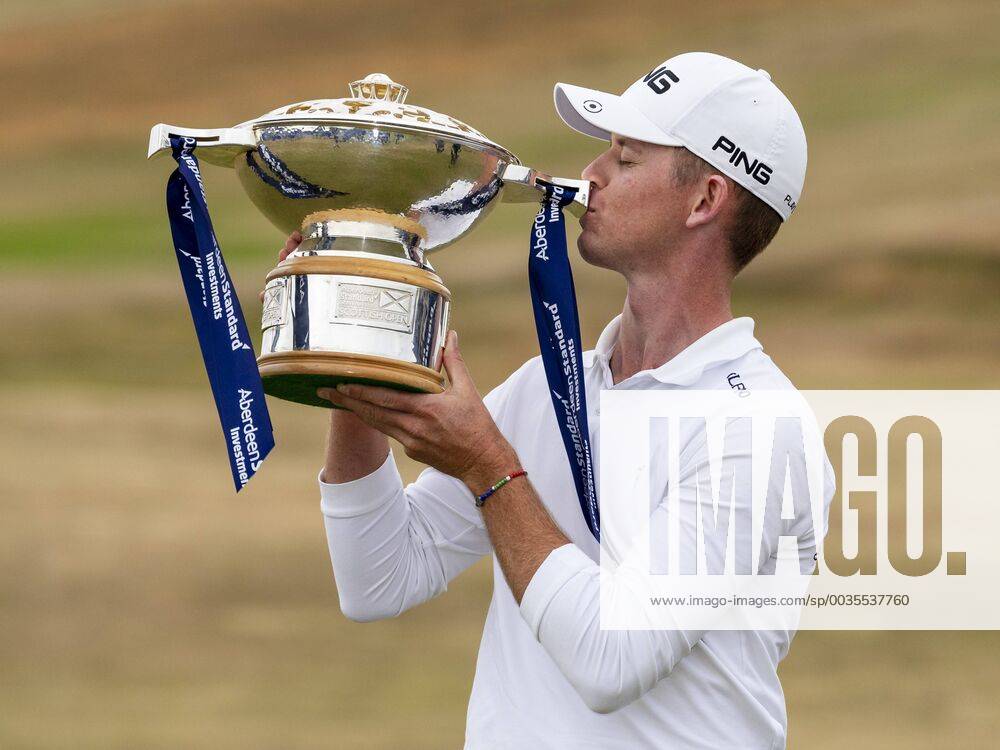 15th July 2018, Gullane Golf Club, Gullane, Scotland; Aberdeen Investments Scottish Open Golf, 4th round; Brandon Stone with the Aberdeen Investments Scottish Open Golf Trophy after winning with a score of -20 ActionPlus12048169 AlanxRennie
