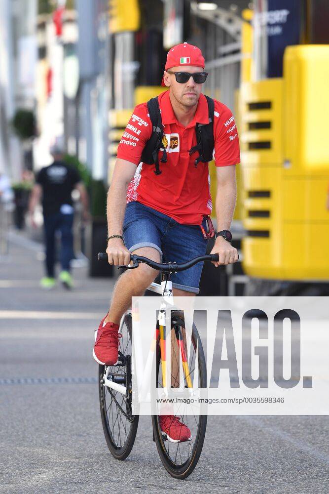 Sebastian VETTEL GER Scuderia Ferrari comes with the road bike to the racetrack through the Paddock Training Formula 1 GP of GermanyGermany Hockenheimring season 2018 on 20 07 2018