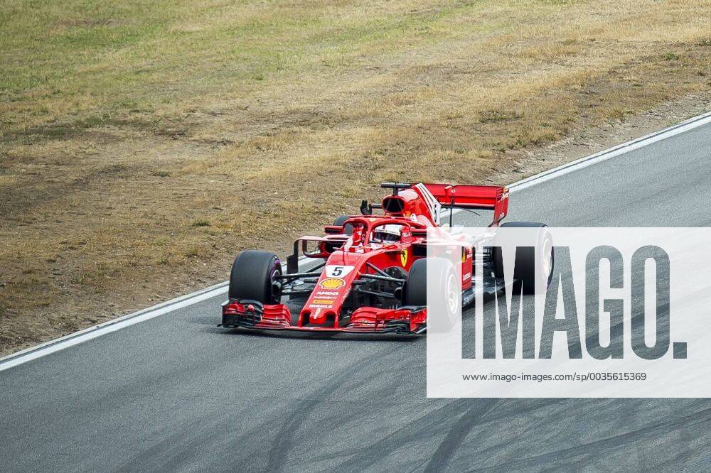 Motorsport Formula 1 Season 2018 2019 Qualifying on Saturday 21 07 2018 at the Hockenheimring in Hockenheim Germany Sebastian Vettel Scuderia Ferrari waves to the fans in the Sachskurve in the Motodrom