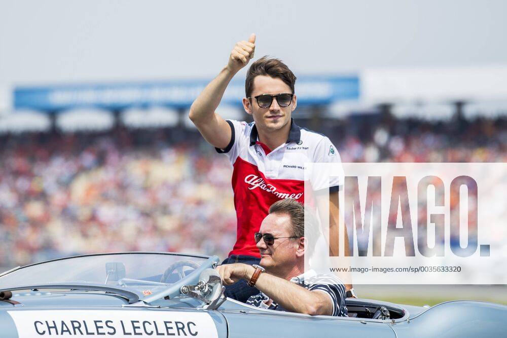 Motorsport Formula 1 Season 2018 2019 Race on Sunday 22 07 2018 at the Hockenheimring in Hockenheim Germany Charles Leclerc Alfa Romeo Sauber F1 Team beckons to the fans