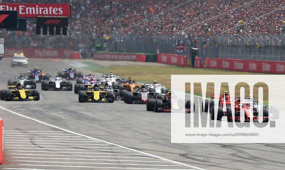 Formula 1 FIA Grand Prix of Germany race 2018 v l race start Sebastian Vettel Ferrari Scuderia Ferrari in front of Valtteri Bottas Mercedes AMG Kimi Raikkonen Ferrari Scuderia Ferrari Max Verstappen Red Bull Racing Nico Hulkenberg Renault Hockenheim