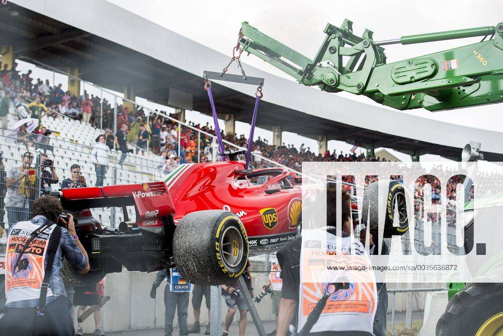 Motorsport Formula 1 Season 2018 2019 Race on Sunday 22 07 2018 at the Hockenheimring in Hockenheim Germany The damaged car of Sebastian Vettel Scuderia Ferrari is transported away