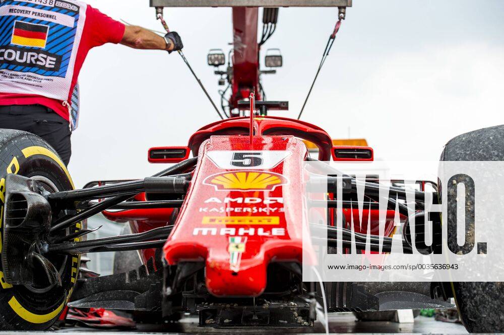 Motorsport Formula 1 Season 2018 2019 Race on Sunday 22 07 2018 at the Hockenheimring in Hockenheim Germany The damaged car of Sebastian Vettel Scuderia Ferrari is transported away