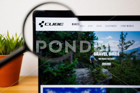 A logo of a Cube on a laptop screen under a magnifying glass background, bicycle, brand, business, button, circle, company, concept, cube, design, emblem, finance, graphic, icon, internet, laptop, logo, magnifying glass, marketing, modern, office, screen, service, sign, symbol, technology, website