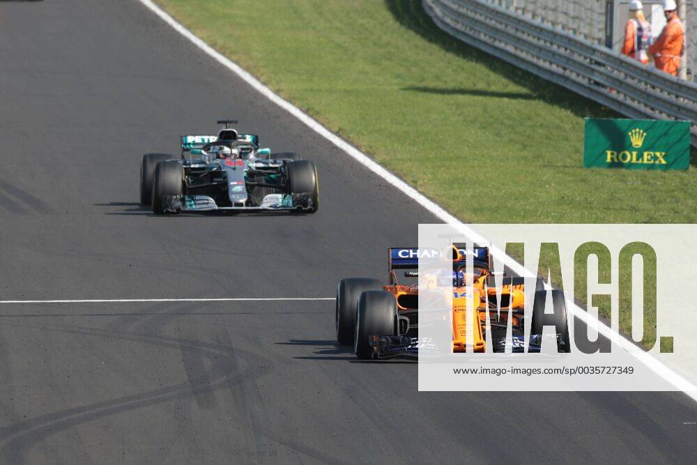 FORMULA 1 - Hungarian GP BUDAPEST,HUNGARY,29.JUL.18 - MOTORSPORTS, FORMULA 1 - Grand Prix of Hungary, Hungaroring. Image shows Fernando Alonso (ESP McLaren) and Lewis Hamilton (GBR Mercedes GP). GEPAxpictures Mueller