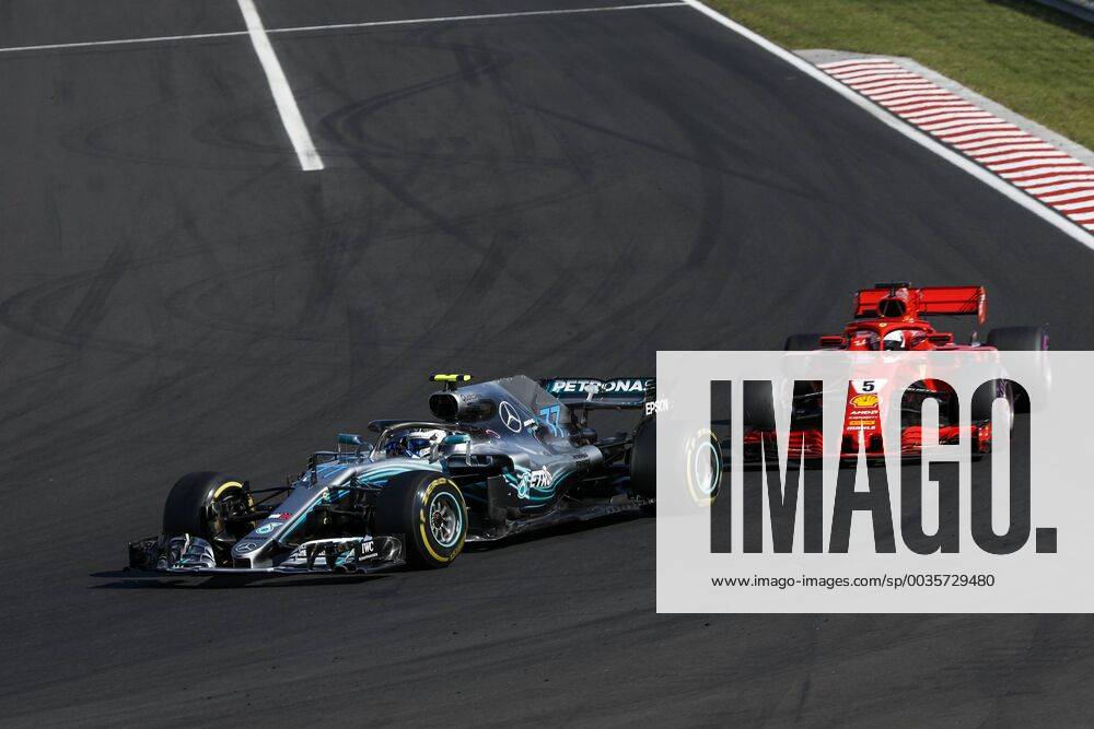Motorsports: FIA Formula One World Championship WM Weltmeisterschaft 2018, Grand Prix of Hungary, 77 Valtteri Bottas (FIN, Mercedes AMG Petronas Motorsport), 5 Sebastian Vettel (GER, Scuderia Ferrari), Budapest Hungary