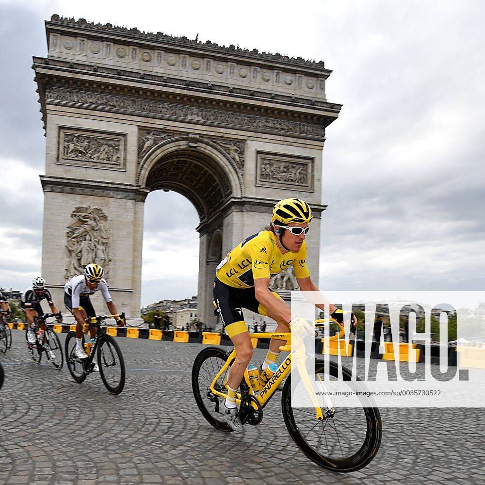 KW30 British Geraint Thomas of Team Sky wearing the yellow jersey of overall leader passes the Arc de Triomphe during the last stage of the 105th edition of the Tour de France cycling race, 116km from Houilles to Paris, France, Sunday 29 July 2018. This year s Tour de France takes place from July 7th to July 29th. DAVIDxSTOCKMAN x05395212x