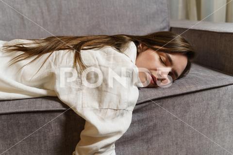 Young beautiful business woman after work lies on the couch, sleeps, rests. tired, drunk, female, sofa, lying, sleepy, drunken, sleeping, woman, take, tall, agent, fatigued, businesswoman, relaxing, bench, high, resting, ebriate, alone, unconscious, solitude, abuse, alcoholism, addiction, depression, alcohol, stress, adult, nap, asleep, people, back, despair, staff, rest, heel, drug, home, dream, working, job, business, groggy, couch
