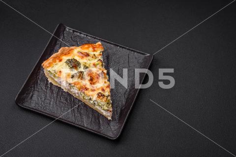 Delicious quiche with broccoli, cheese, chicken, spices and herbs on a dark concrete background broccoli, quiche, food, cheese, vegetable, meal, pie, dinner, crust, lunch, pastry, dish, egg, green, baked, cuisine, tart, snack, homemade, gourmet, french, healthy, kitchen, eating, delicious, breakfast, cooking, cake, fish, cream, table, recipe, traditional, salmon, dough, vegetarian, lorraine, background, rustic, ingredient, spinach, tasty, cooked, appetizer, gratin, wood, organic