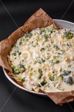 Delicious quiche with broccoli, cheese, chicken, spices and herbs on a dark concrete background broccoli, quiche, food, cheese, vegetable, meal, pie, dinner, crust, lunch, pastry, dish, egg, green, baked, cuisine, tart, snack, homemade, gourmet, french, healthy, kitchen, eating, delicious, breakfast, cooking, cake, fish, cream, table, recipe, traditional, salmon, dough, vegetarian, lorraine, background, rustic, ingredient, spinach, tasty, cooked, appetizer, gratin, wood, organic