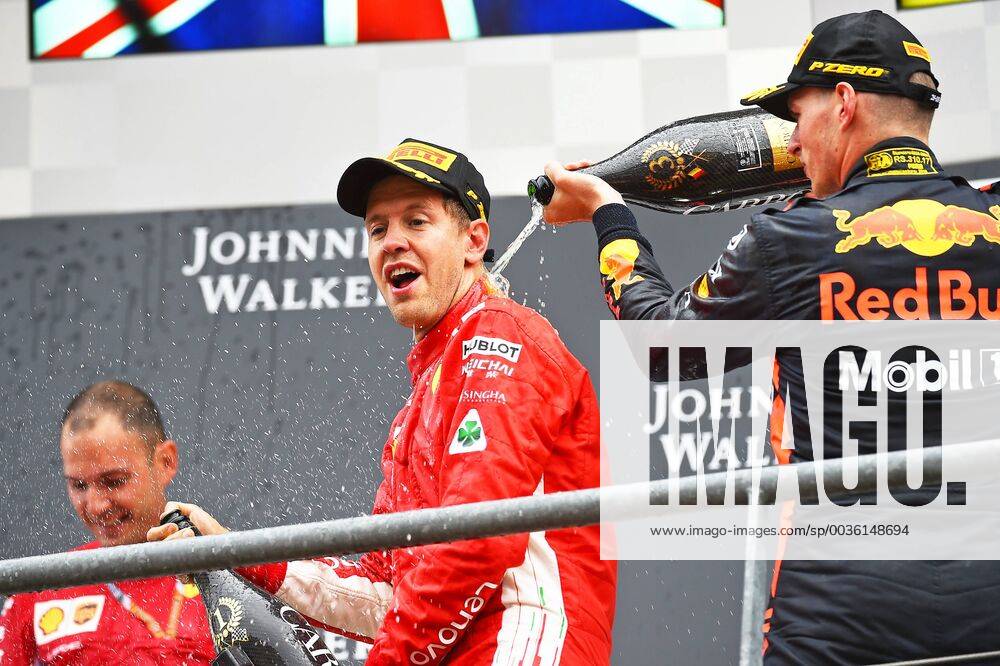 24 08 26 08 2018 FIA Formula 1 Championship Grand Prix of Belgium 2018 Grand Prix Belgium GP Belgian Pictured v l Winner Sebastian Vettel GER 5 Scuderia Ferrari sprinkled by Max Verstappen NED 33 Aston Martin Red Bull Racing with Champion Champagne Spa Francochamps Belgium eel-fotografie Eberhard Krieger