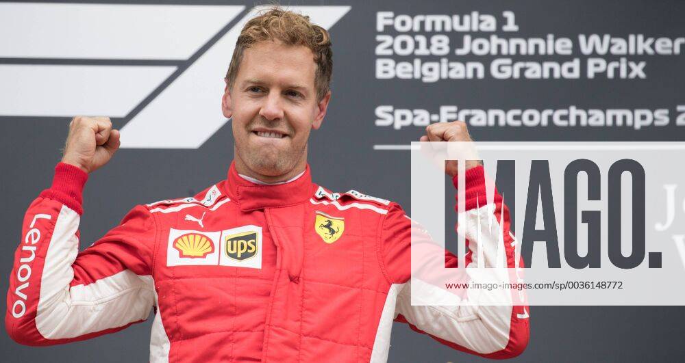 Ferrari s German driver Sebastian Vettel celebrates on the podium after winning the Spa-Francorchamps Formula One Grand Prix of Belgium race, in Spa-Francorchamps, Sunday 26 August 2018. BENOITxDOPPAGNE x05414416x