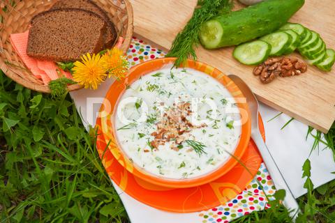 Tarator, cold sour milk soup in an orange bowl food, cold, dill, tarator, soup, bowl, cuisine, vegetable, cucumber, yogurt, summer, traditional, freshness, dinner, lunch, appetizer, bulgarian, cream, yoghurt, green, vegetarian, spoon, white, eating, meal, dish, garlic, tzatziki, healthy, leaf, gourmet, herb, spice, refreshment, cup, parsley, dieting, nut, liquid, cooked, fresh, table, organic, plate, hash, cooking, drink, mint, joghurt, photography