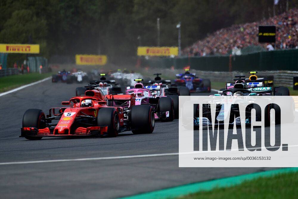 Sebastian Vettel Scuderia Ferrari passing Lewis Hamilton Mercedes Grand Prix Formula 1 GP Belgium at Spa 26 08 2018 Photo mspb Jean Petin Sebastian Vettel driving past Lewis Hamilton Formula 1 GP Belgium 2018