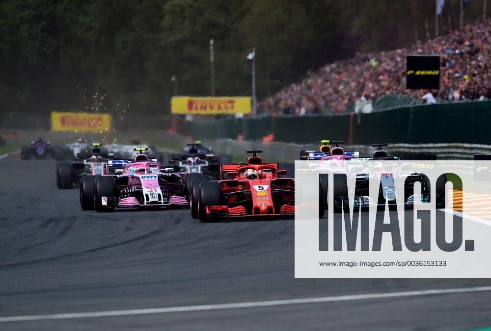 Sebastian Vettel Scuderia Ferrari passing Lewis Hamilton Mercedes Grand Prix Formula 1 GP Belgium at Spa 26 08 2018 Photo mspb Jean Petin Sebastian Vettel driving past Lewis Hamilton Formula 1 GP Belgium 2018