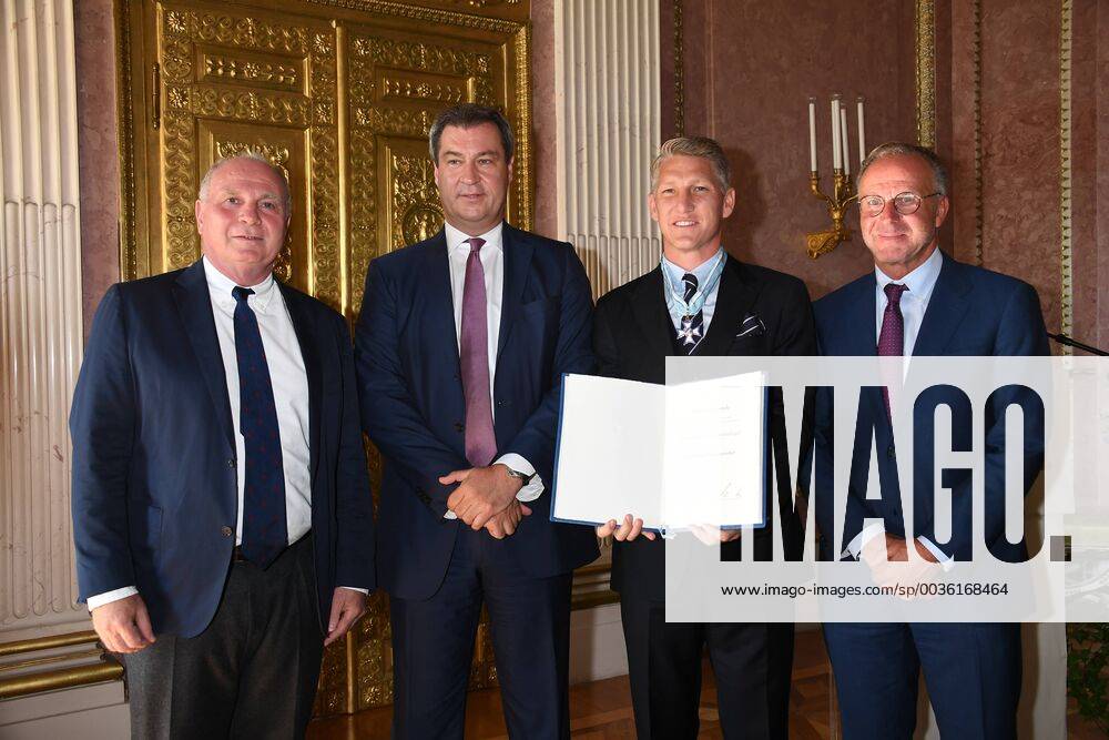 Uli Hoeneß Bavarian Prime Minister Markus Söder Bastian Schweinsteiger and Karl Heinz Rummenigge Award of the Bavarian Order of Merit to Bastian Schweinsteiger Honoring the Order of the State Chancellery Prince Carl Palais Munich 27 August 2018