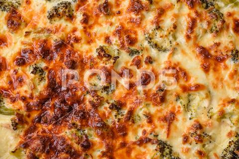 Delicious quiche with broccoli, cheese, chicken, spices and herbs on a dark concrete background broccoli, quiche, food, cheese, vegetable, meal, pie, dinner, crust, lunch, pastry, dish, egg, green, baked, cuisine, tart, snack, homemade, gourmet, french, healthy, kitchen, eating, delicious, breakfast, cooking, cake, fish, cream, table, recipe, traditional, salmon, dough, vegetarian, lorraine, background, rustic, ingredient, spinach, tasty, cooked, appetizer, gratin, wood, organic