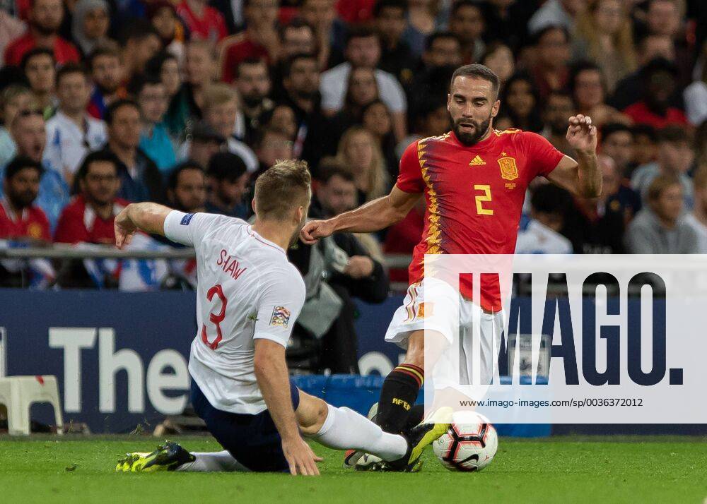Football - 2018 2019 UEFA Nations League A - Group Four: England vs. Spain Luke Shaw (England) slides into the tackles with Dani Carvajal (Spain) at Wembley Stadium. COLORSPORT DANIEL BEARHAM csp_eng_spa_080918_