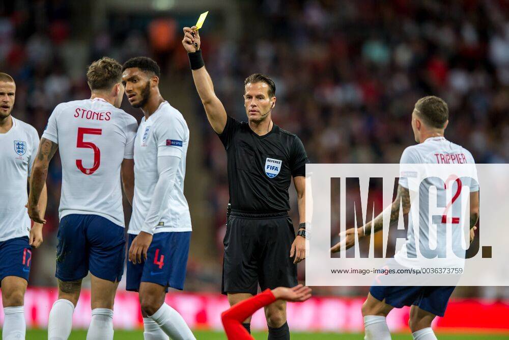 John Stones of England receives a yellow card during the UEFA Nation League, Group 4, League A match between England and Spain at Wembley Stadium, London, England on 8 September 2018.