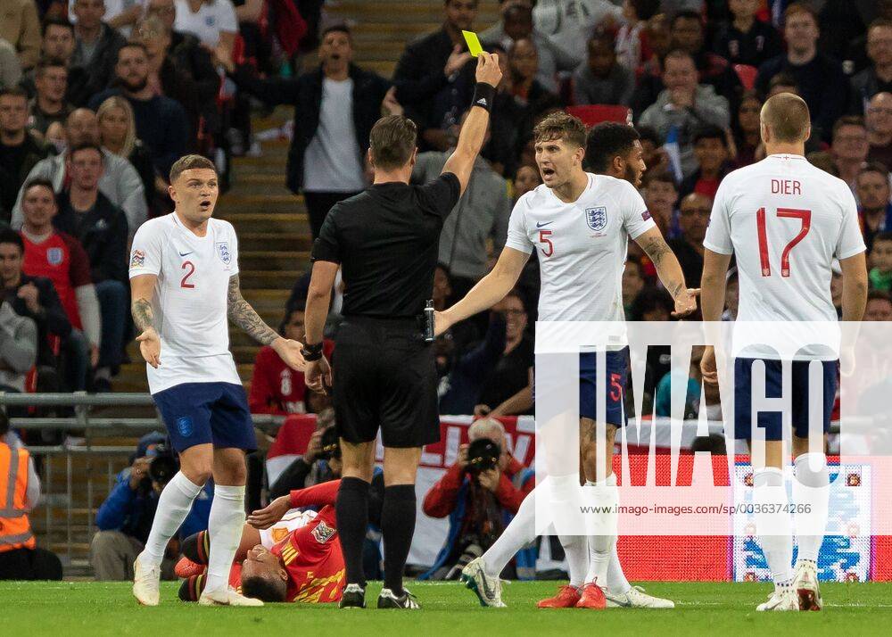 Football - 2018 2019 UEFA Nations League A - Group Four: England vs. Spain John Stones (England) and Kieran Trippier (England) protest to the Referee Danny Makkelie (NED) as the England player receives a yellow card at Wembley Stadium. COLORSPORT DANIEL BEARHAM csp_eng_spa_080918_