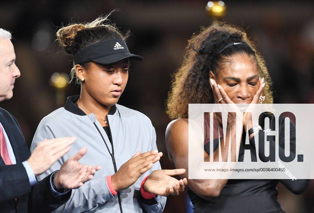 Winner Naomi Osaka (L) of Japan and runner-up Serena Williams of the United States react during the award ceremony after the women s singles final match of the US Open tennis tournament at Arthur Ashe Stadium, USTA Billie Jean King National Tennis Center in Flushing, Queens, New York City, United States, September 8, 2018. Noxthirdxpartyxsales (85372570)