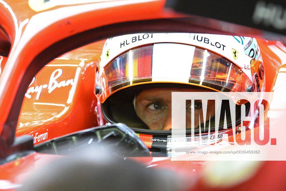 (180915) -- SINGAPORE, Sept. 15, 2018 -- Ferrari driver Sebastian Vettel of Germany looks on in the second practise session of the Formula One Singapore Grand Prix Night Race held at the Marina Bay Street Circuit on Sept. 14, 2018. ) (SP)SINGAPORE-F1 GRAND PRIX NIGHT RACE-PRACTISE ThenxChihxWey