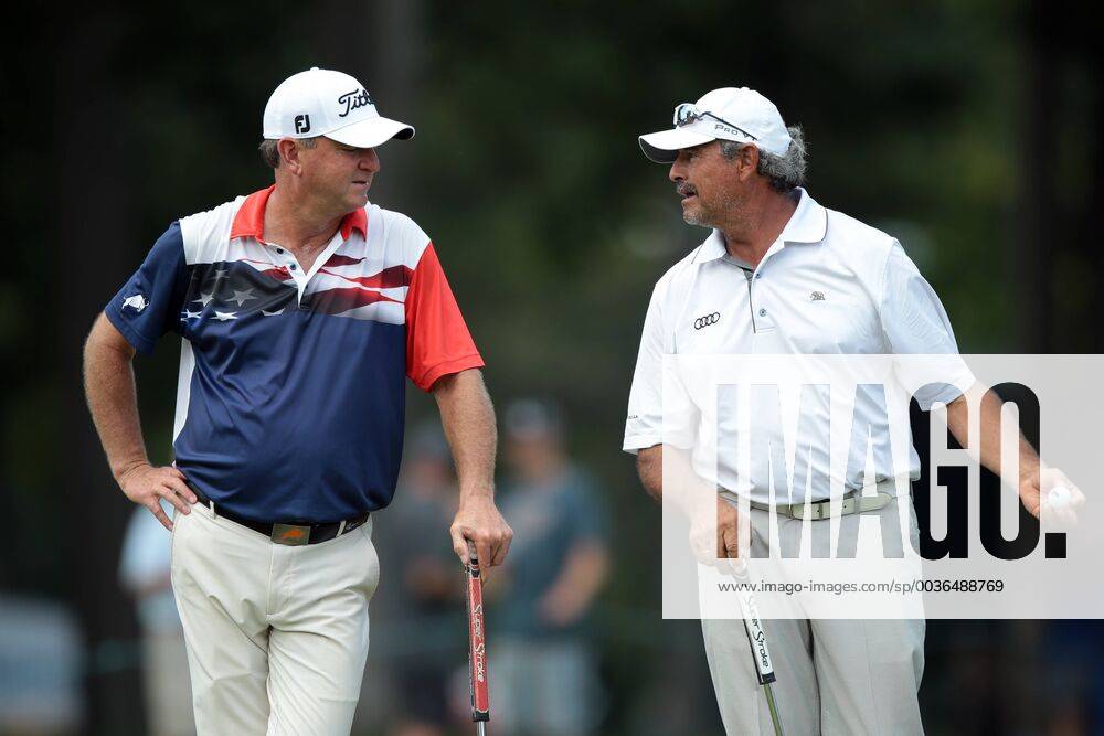 Grand Blanc, Michigan, United States - Carlos Franco of Paraguay (right) talks to Wes Short Jr. of the USA on the 11th green during the second round of The Ally Challenge presented by McLaren at Warwick Hills Golf & Country Club in Grand Blanc, MI, USA Saturday, September 15, 2018. The Ally Challenge 2018 - ZUMAn230 20180915_zaa_n230_1100