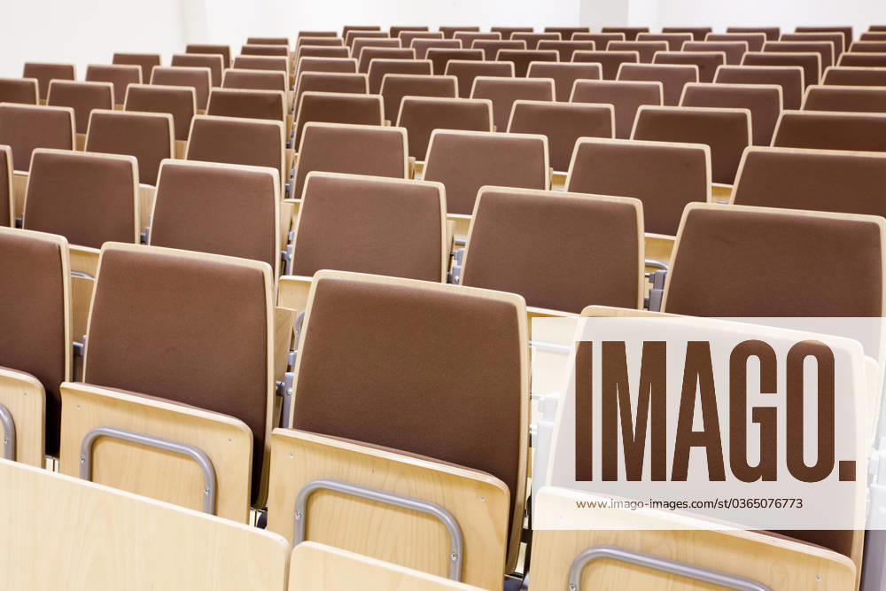Empty auditorium with rows of brown chairs , 6520870.jpg, auditorium, empty, brown, chairs, chair, row, rows, hall, room, conference, conference hall, lecture hall, lecture, line, lines, nobody, RECORD DATE NOT STATED