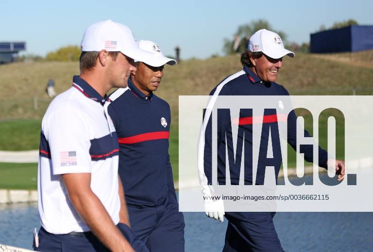 Bryson DeChambeau (L), Tiger Woods (C) and Phil Mickelson participate in a practice session at Le Golf National in Guyancourt near Paris on September 25, 2018. PAR20180925020 DAVIDxSILPA