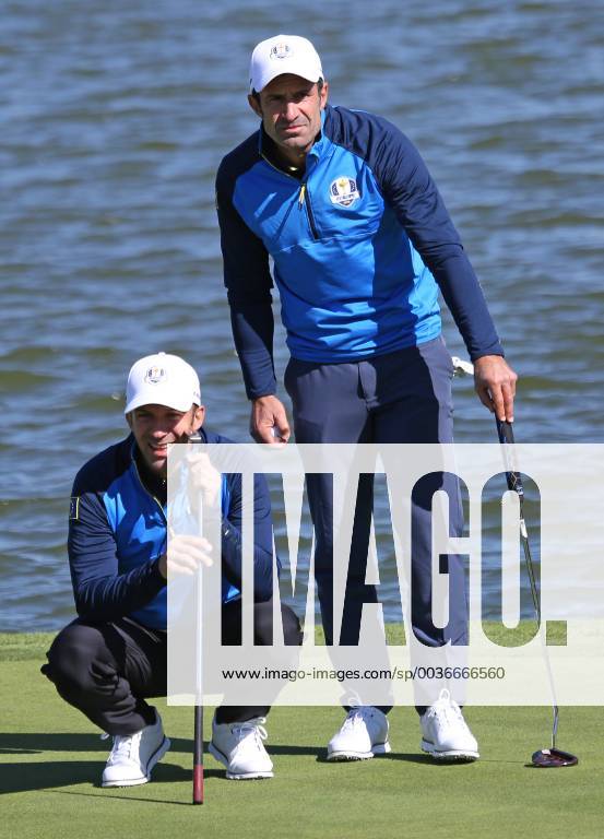 Alessandro Del Piero (L) and Luis Figo line up a shot during a Ryder Cup 2018 celebrity tournament at Le Golf National in Guyancourt near Paris on September 25, 2018. The three-day main event Ryder Cup featuring Team USA versus Team Europe starts Friday, September 28th. PAR20180925090 DAVIDxSILPA