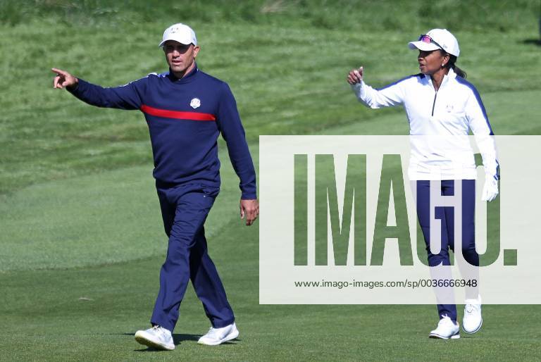 Kelly Slater (L) and Condoleezza Rice walk the fairway during a Ryder Cup 2018 celebrity tournament at Le Golf National in Guyancourt near Paris on September 25, 2018. The three-day main event Ryder Cup featuring Team USA versus Team Europe starts Friday, September 28th. PAR20180925101 DAVIDxSILPA