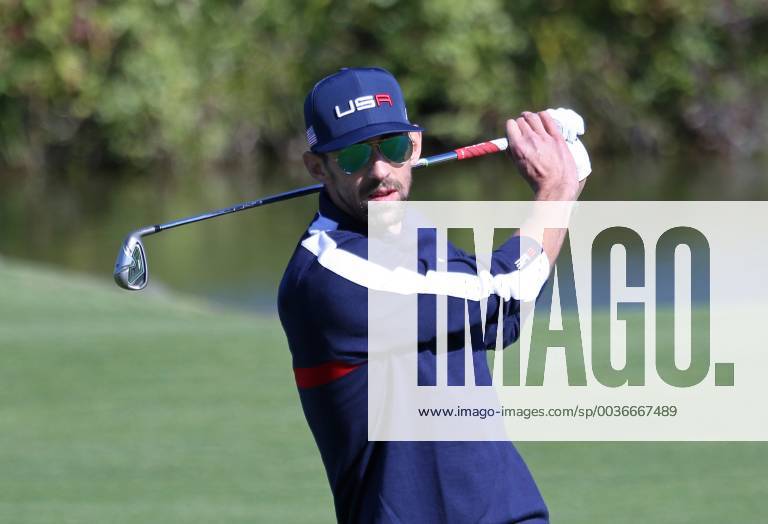 Michael Phelps hits a shot during a Ryder Cup 2018 celebrity tournament at Le Golf National in Guyancourt near Paris on September 25, 2018. The three-day main event Ryder Cup featuring Team USA versus Team Europe starts Friday, September 28th. PAR20180925106 DAVIDxSILPA