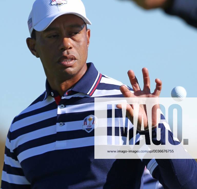 Tiger Woods catches a golf ball during a Ryder Cup 2018 practice session at Le Golf National in Guyancourt near Paris on September 26, 2018. The three-day tournament features Team USA versus Team Europe and starts Friday, September 28th. PAR20180926037 DAVIDxSILPA