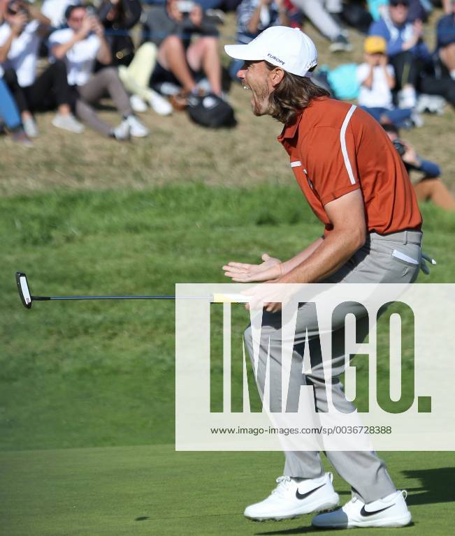 Tommy Fleetwood reacts after making a putt on the 9th green on day two of the Ryder Cup at Le Golf National in Guyancourt near Paris on September 29, 2018. Fleetwood and teammate Francesco Molinari won the 9th hole against Tiger Woods and Bryson DeChambeau. PAR20180929032 DAVIDxSILPA