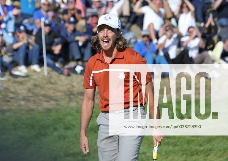 Tommy Fleetwood reacts after making a putt on the 9th green on day two of the Ryder Cup at Le Golf National in Guyancourt near Paris on September 29, 2018. Fleetwood and teammate Francesco Molinari won the 9th hole against Tiger Woods and Bryson DeChambeau. PAR20180929034 DAVIDxSILPA