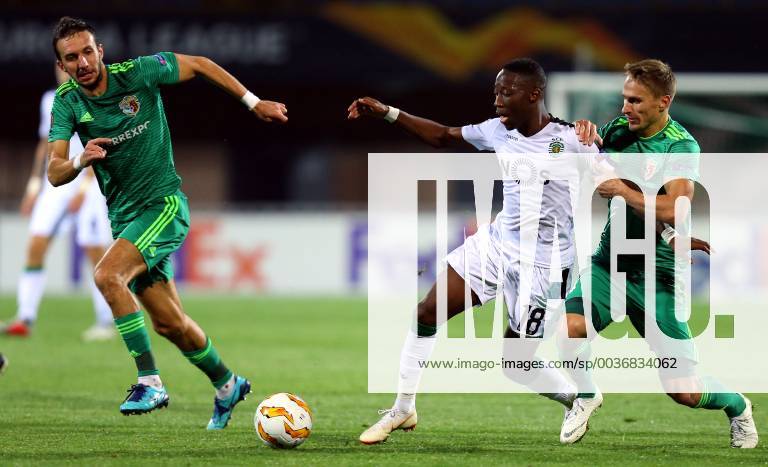Poltava(Ukraine) FC Vorskla-Sporting CP Europa League men s football Carlos Mane(C)Sporting CP between Vyacheslav Sharpar(L),Ihor Perduta(R) FC Vorskla :Str