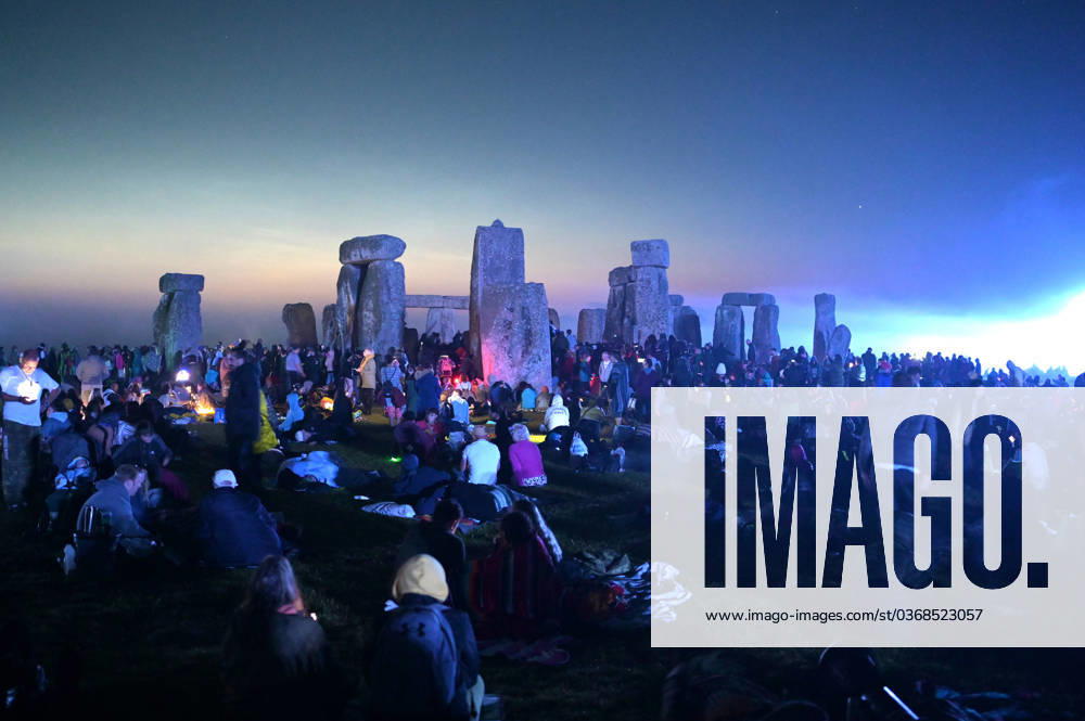 Summer Solstice Stonehenge Revellers including Hippies and Druids return to Stonehenge to celebrate the summer Solstice. Thousands descended on the ancient stones to witness the sunrise on the longest day of the year. The sun rose at 4:49am and the official Solstice officially begins at 3;57pm GMT. English Heritage allow controlled access to the ancient stone circle to allow the celebration that marks the official start of summer. Wiltshire Stonehenge UK