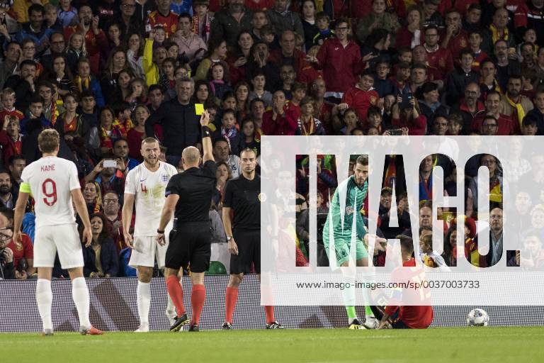 Seville, Spain - ERIC DIER of England (C) receives a yellow card during the UEFA Nations League Group A4 soccer match between Spain and England at the Benito Villamarin Stadium Soccer 2018 - Spain vs England - ZUMAa142 20181015_zap_a142_013