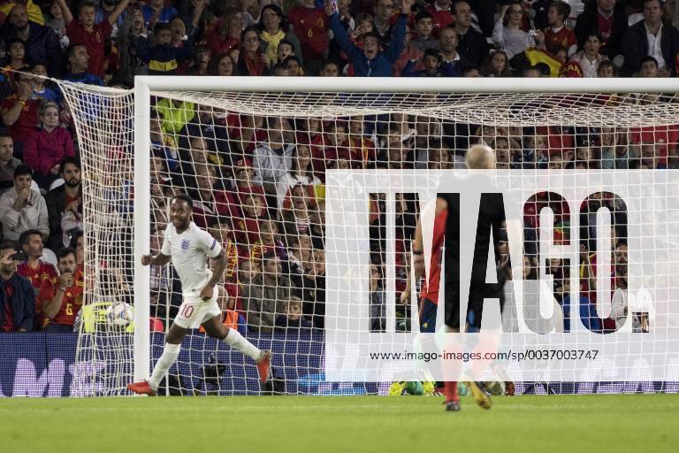 Seville, Spain - RAHEEM STERLING of England (L ) celebrates after scoring 3-0 during the UEFA Nations League Group A4 soccer match between Spain and England at the Benito Villamarin Stadium Soccer 2018 - Spain vs England - ZUMAa142 20181015_zap_a142_014