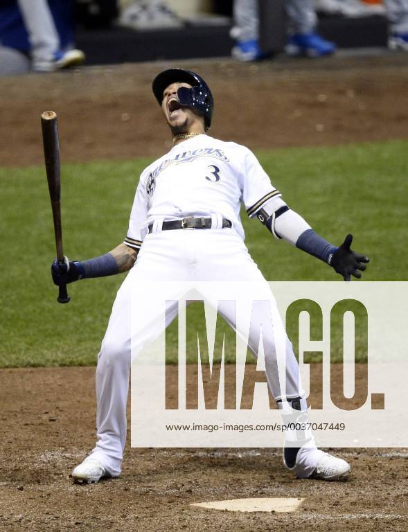 KW42 Milwaukee Brewers Orlando Arcia reacts after a high, inside pitch during the seventh inning against the Los Angeles Dodgers in National League Championship Series game six at Miller Park on October 19, 2018 in Milwaukee, Wisconsin. The Dodgers lead the series against the Brewers 3-2. MIL20181019231 BRIANxKERSEY